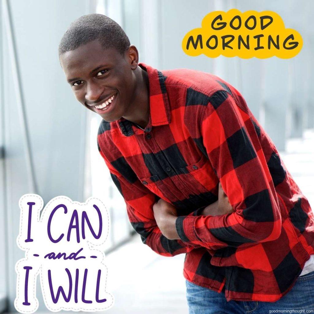 Portrait of a happy young African man standing with his arms crossed and laughing, African American Good Morning Images