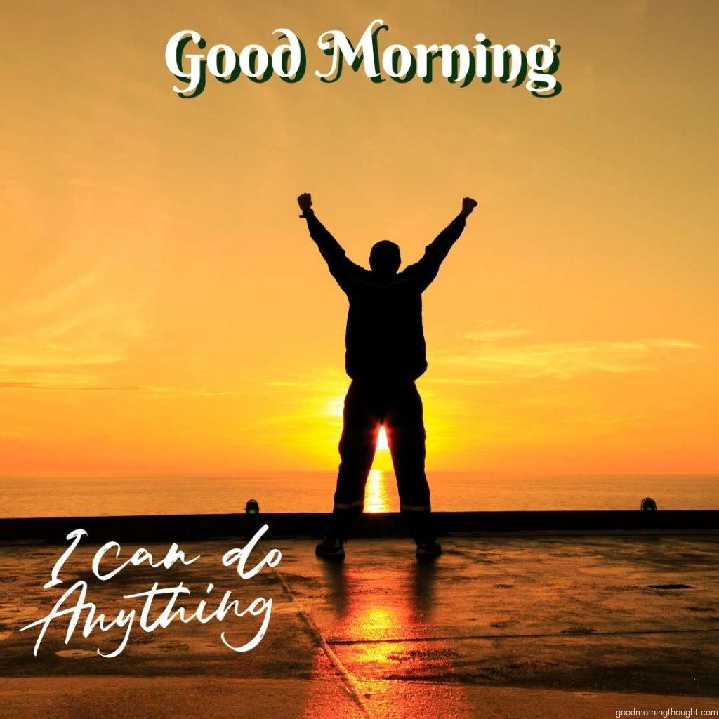 Silhouette Image of a Happy Man Showing Winner Action, _Good Morning_ Text