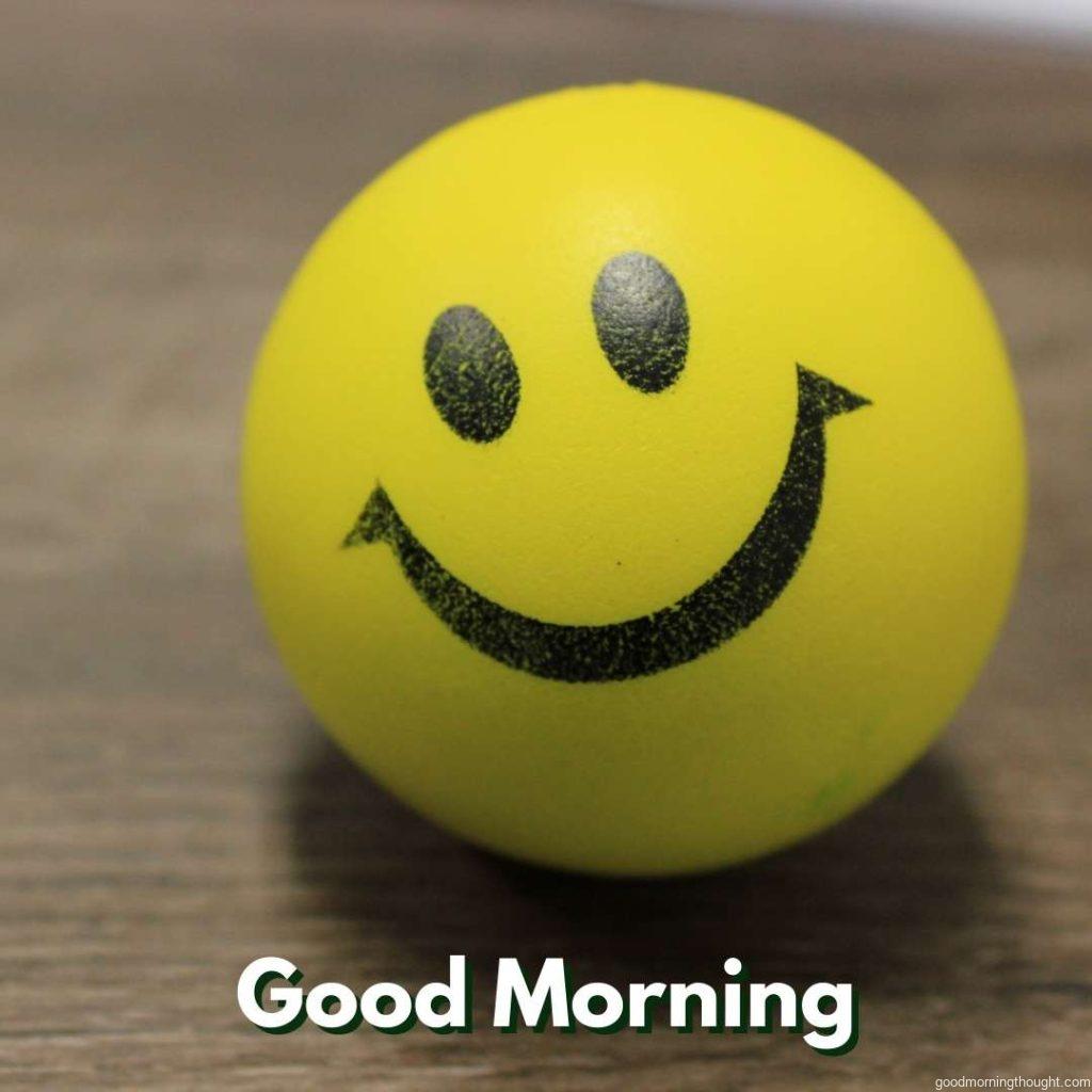 Smiley Ball on a Wooden Surface, _Good Morning_ text