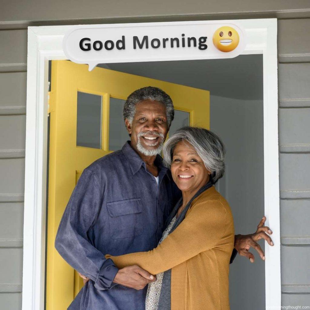 They are standing by the yellow front door and smiling towards the camera. African American Good Morning Images