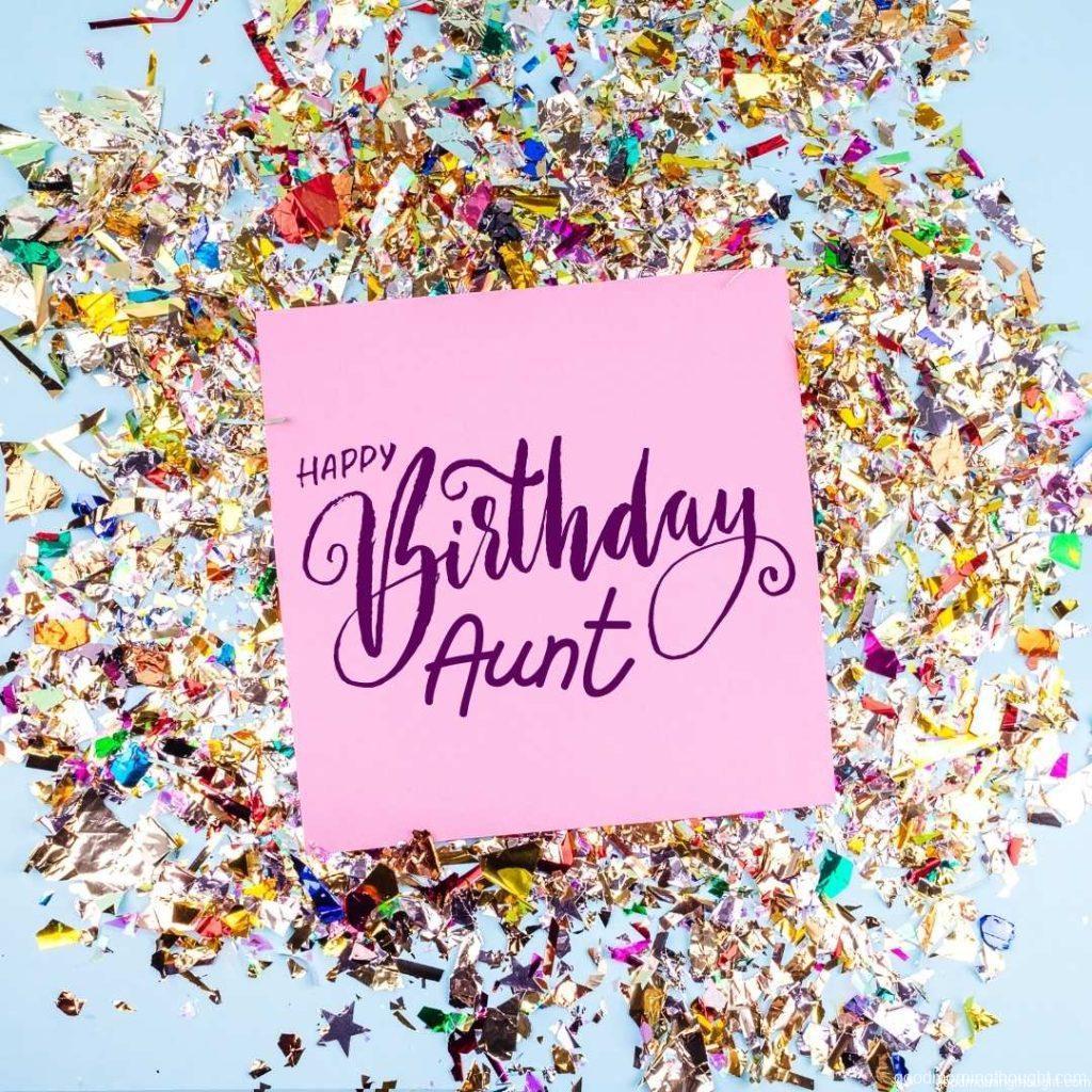 colourful Aunt's Birthday celebration background with confetti,stars, fireworks, and decorations on a pink-blue background