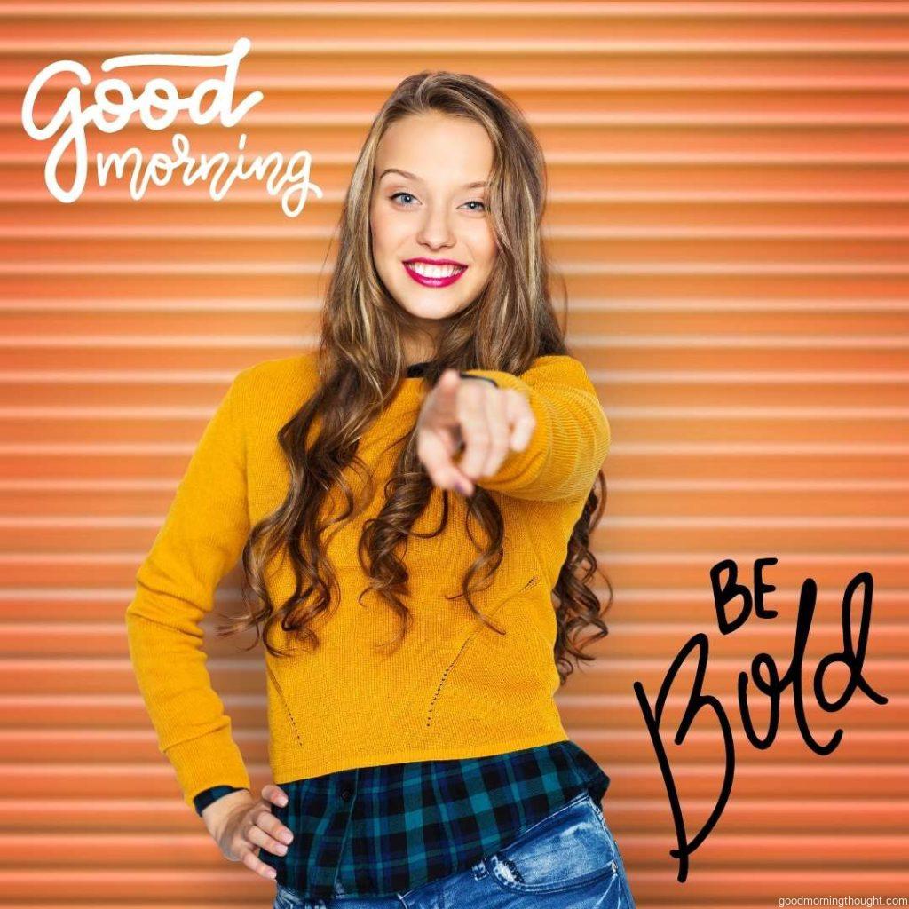 people, style, and fashion concept_ a happy young woman or teen girl in casual clothes pointing a finger at you over an orange ribbed wall background, Happy Good Morning Images